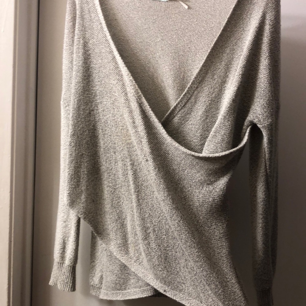 Front cross sweater